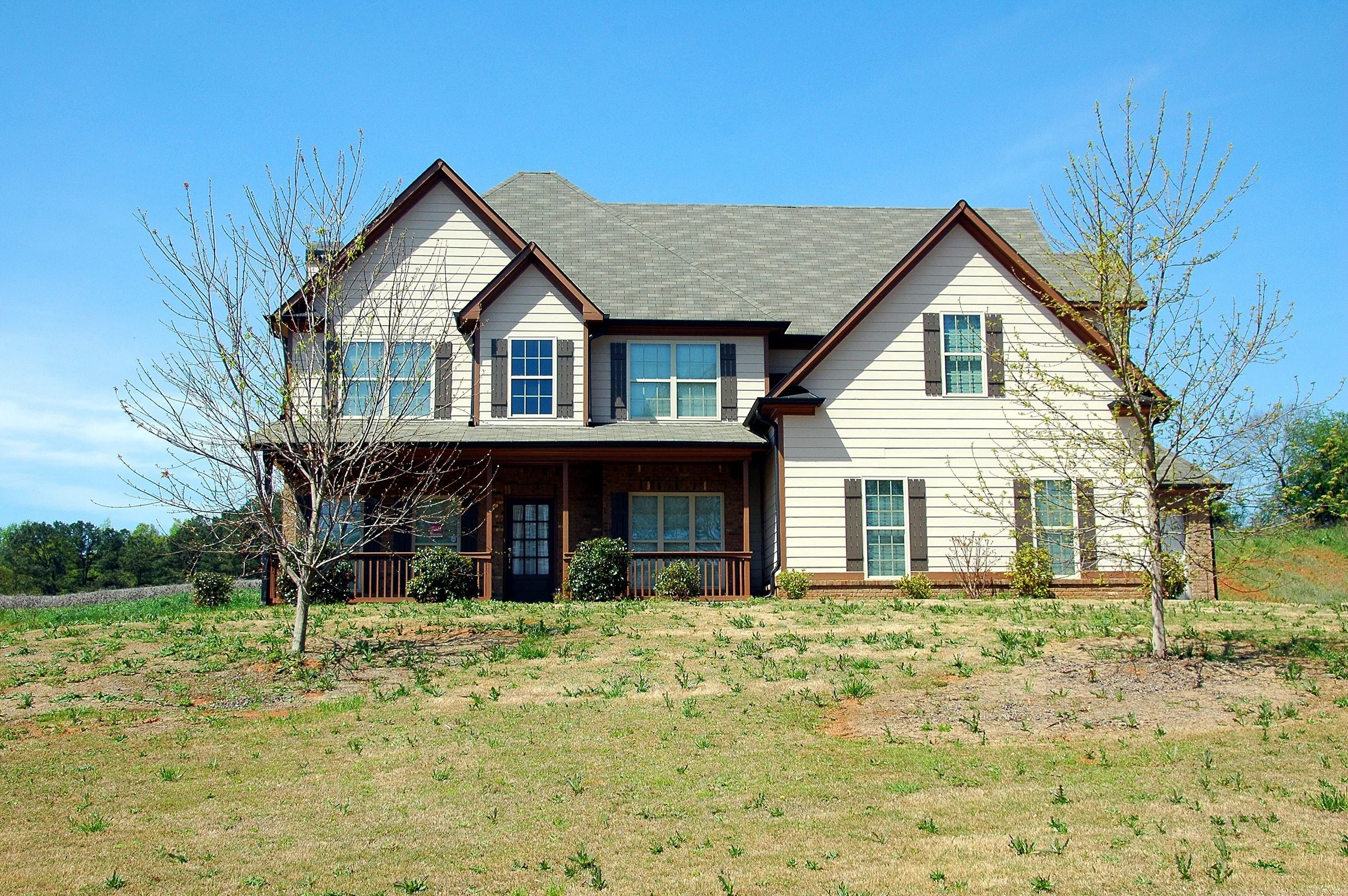 Two-story country house before and after day to dusk conversion original