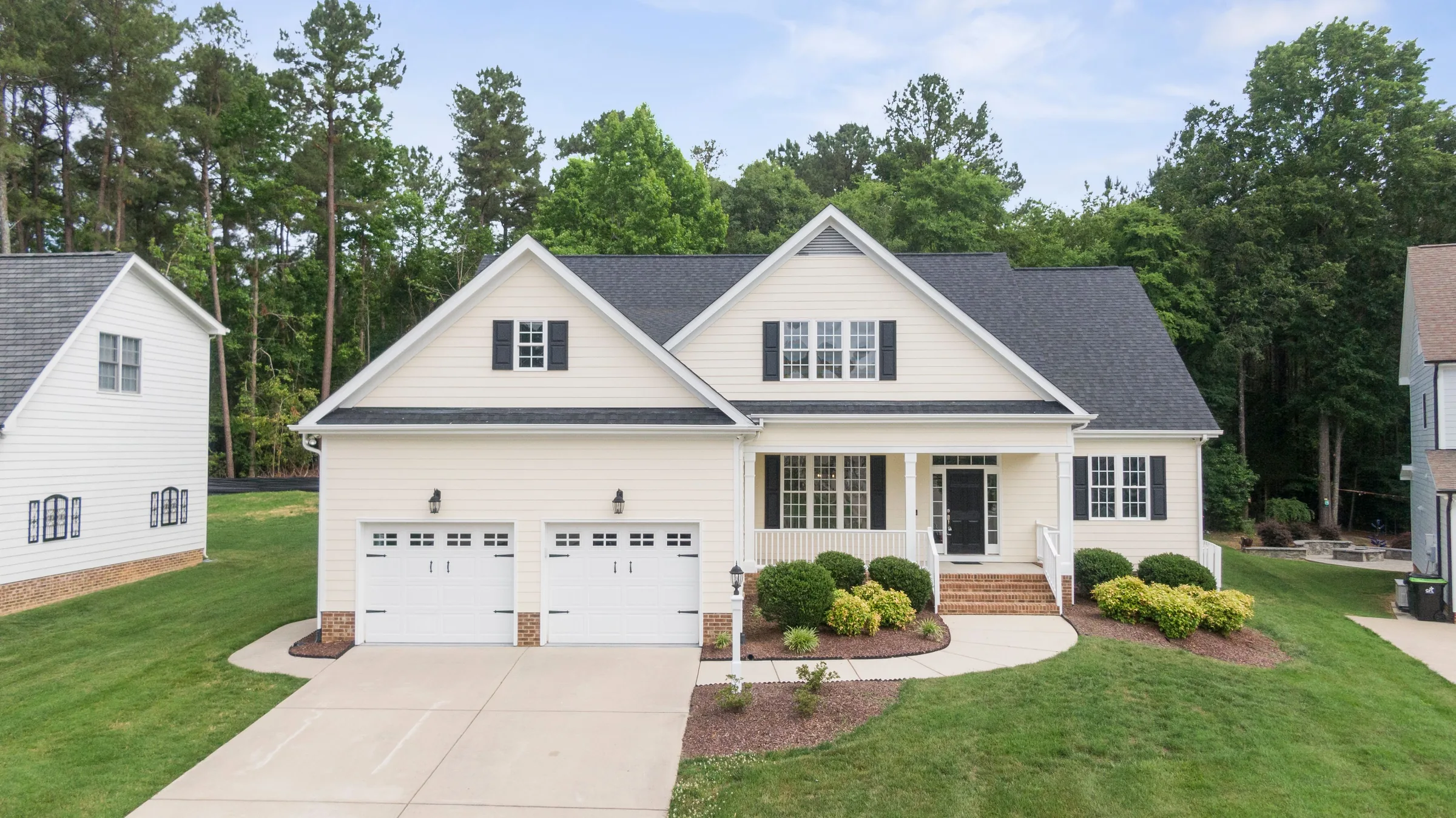 White suburban house before and after day to dusk conversion original